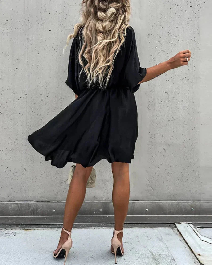 Nomi™ - Elegante abito fluido per un look alla moda